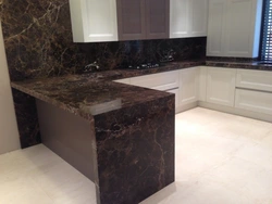 Black Marble Countertop In The Kitchen Interior