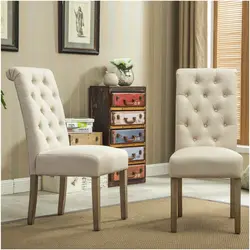 Soft chairs in the interior of the living room