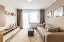 Curtains for a beige sofa in the living room interior