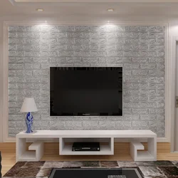 Гипсовые панели в интерьере гостиной с телевизором