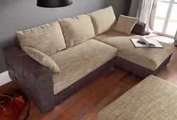 Sofa with one armrest in the living room interior