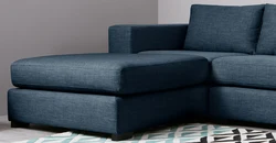 Sofa with one armrest in the living room interior