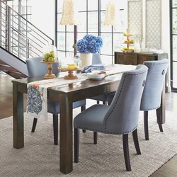 Kitchen Interior With Dark Table And Chairs