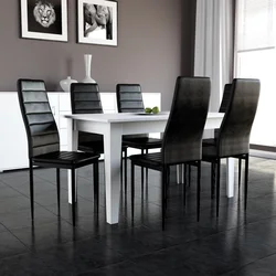 Kitchen Interior With Dark Table And Chairs