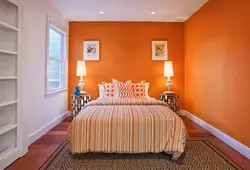 One wall of a different color in the bedroom interior