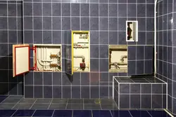 Интерьердегі ванна бөлмесіндегі плиткаларға арналған люктер