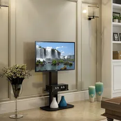 Телевизор на кронштейне в интерьере в гостиной
