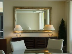 Mirror with lighting in the living room in the interior of the living room