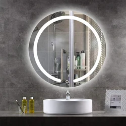 Круглое зеркало с подсветкой в ванную в интерьере