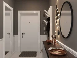 Door With A Mirror In The Interior Of A Small Entrance Hallway