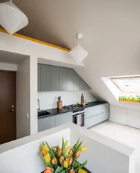 Kitchen design with sloping wall