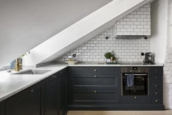 Kitchen design with sloping wall