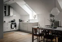 Kitchen design with sloping wall