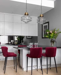 Kitchen design with burgundy chairs