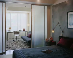 Bedroom behind a glass partition design