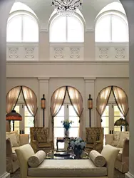 Living room design with arched windows