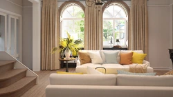 Living room design with arched windows