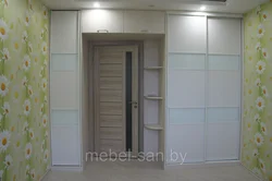 Wardrobe design with a mezzanine in the hallway
