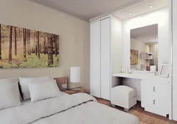 Дизайн спальни с комодом и столиком