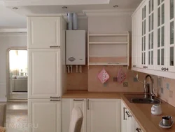 Kitchen with boiler and balcony design
