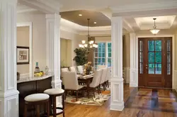 Living room design with kitchen and pillar