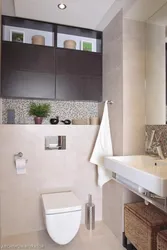 Installation design in the bathroom with shelves