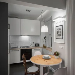 Design of a three-room apartment with a small kitchen
