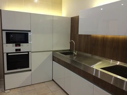 Kitchen design with microwave cabinet