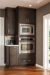 Kitchen design with microwave cabinet