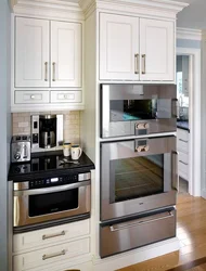 Kitchen design with microwave cabinet