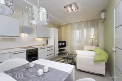 Rectangular kitchen design with sofa and TV