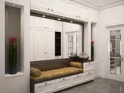 Hallway design with soft seat and mirrors
