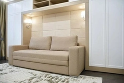 Bedroom design with sofa and wardrobe