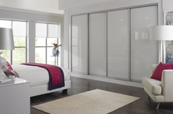Bedroom design with sofa and wardrobe