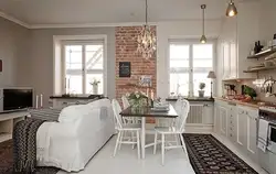 Design of a studio apartment with a kitchen by the window
