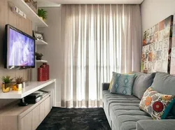 Living room design with corner sofa and TV