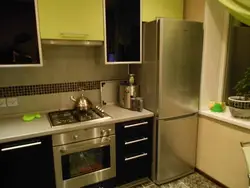 Kitchen with design gas stove, refrigerator and microwave