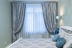 Bedroom design with white wallpaper and gray curtains