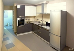 Kitchen design with left corner and refrigerator by the window