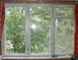 Wooden windows in the apartment photo