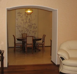Arch in an apartment with wallpaper photo