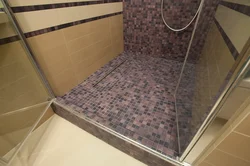 Shower in apartment on the floor photo