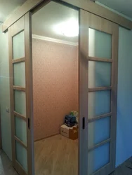 Door to the storage room in a Khrushchev apartment photo