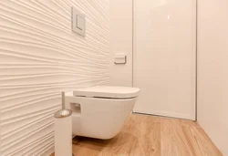 Bir mənzil fotoşəkilində tualet üçün dekorativ gips