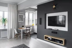 TV in the interior of a one-room apartment
