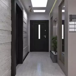 Двери в интерьере квартиры с серыми полами