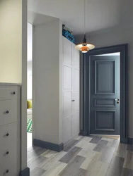 Doors In The Interior Of An Apartment With Gray Floors