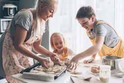 Photo of my mom at home in the kitchen