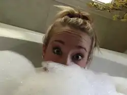 Photo of blonde in bath
