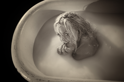Photo of blonde in bath
